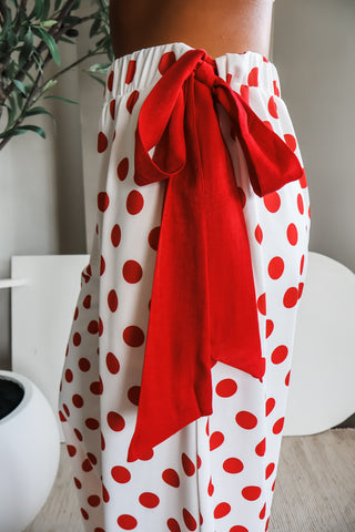 Out of your league • red polka dot pants • tie