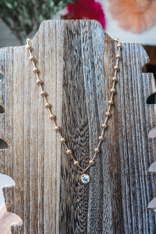 Rachel • gold beaded pendant