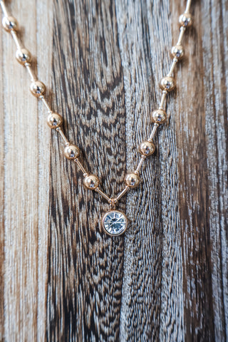 Rachel • gold beaded pendant