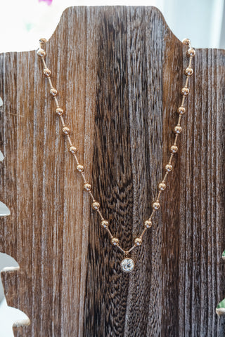 Rachel • gold beaded pendant