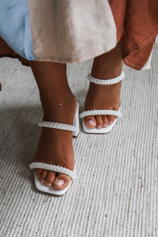 Pearls are always appropriate •block heel