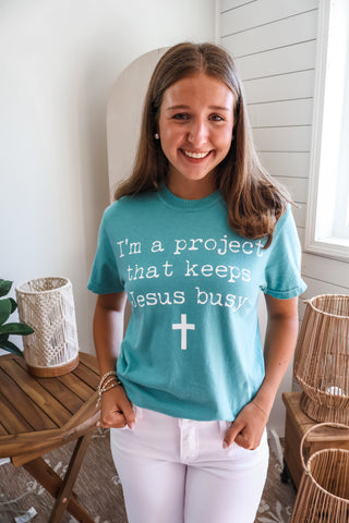 I’m A Project That Keeps Jesus Busy Graphic Tee • Seafoam