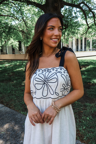Pretty with a punch • oatmeal midi dress