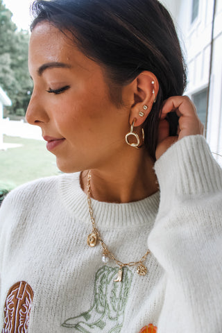 Chomping At The Bit Hoop Earrings • Gold