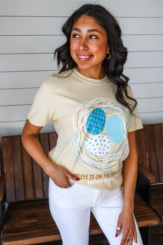 His Eye Is On The Sparrow Graphic Tee • Butter