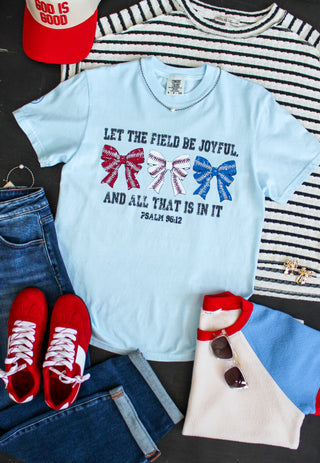 Let the field be joyful and all that is in it. Powder blue tee