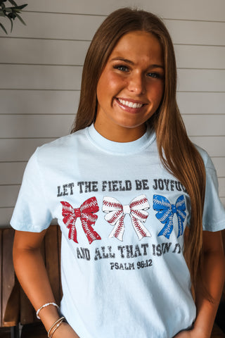 Let the field be joyful and all that is in it. Powder blue tee