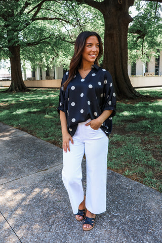 Worth the attention • black silk polka dot top