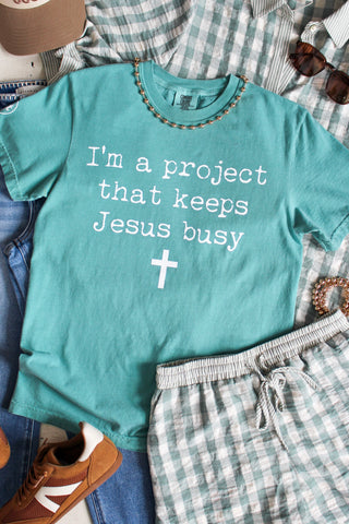 I’m A Project That Keeps Jesus Busy Graphic Tee • Seafoam