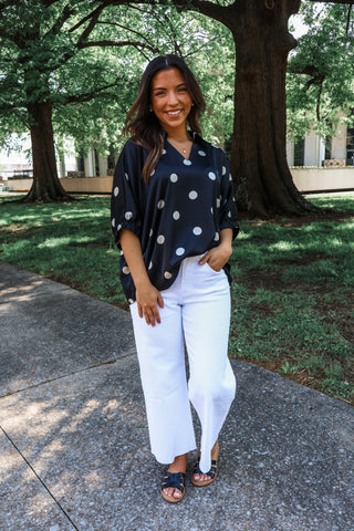 Worth the attention • black silk polka dot top