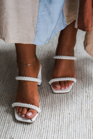 Pearls are always appropriate •block heel