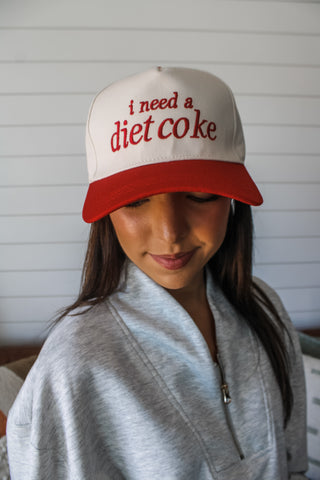 I Need A Diet Coke Trucker Hat • Red