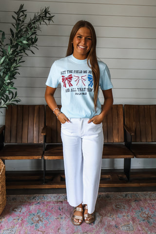 Let the field be joyful and all that is in it. Powder blue tee