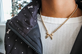 Good Cheer Bow Necklace • Gold