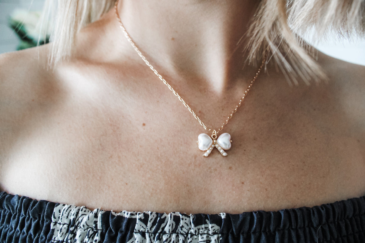Wrapped In Your Love Bow Necklace • Pearl