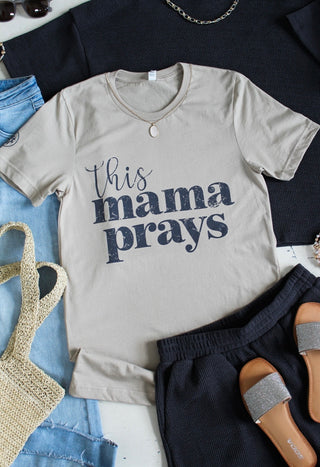 This Mama Prays • sand