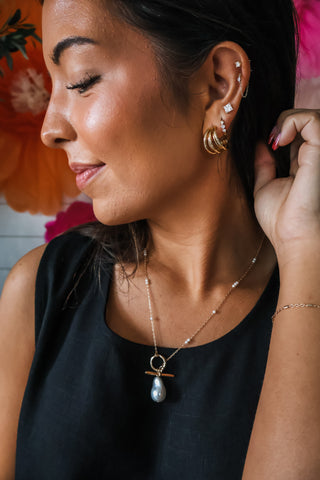 Timeless Twist Hoop Earrings • Gold