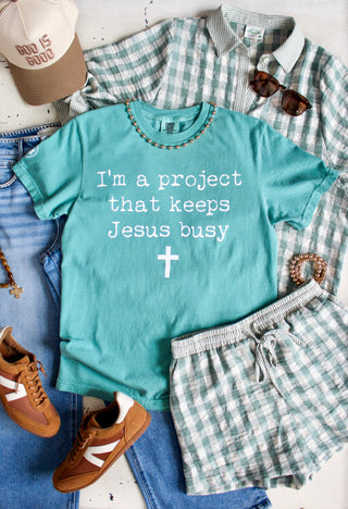 I’m A Project That Keeps Jesus Busy Graphic Tee • Seafoam