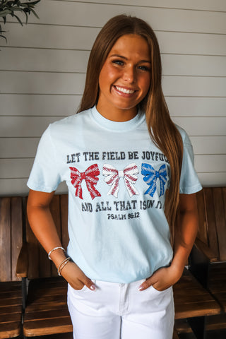 Let the field be joyful and all that is in it. Powder blue tee